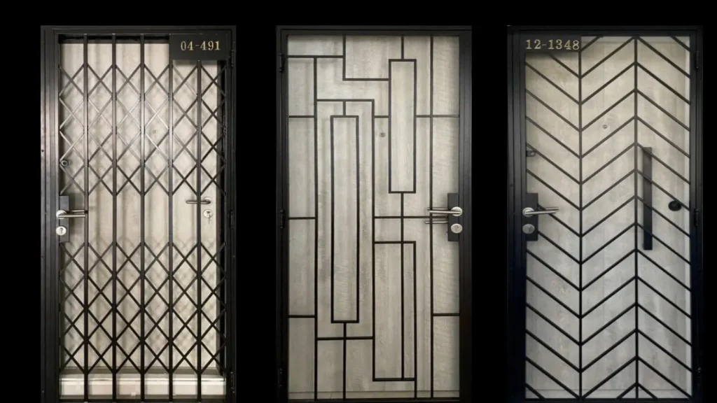 Three black metal HDB main gates in Singapore featuring different grille styles: diamond lattice on the left (unit 04-491), abstract rectangular geometric pattern in the centre, and chevron design on the right (unit 12-1348), all with light wood-effect panels. Image 2